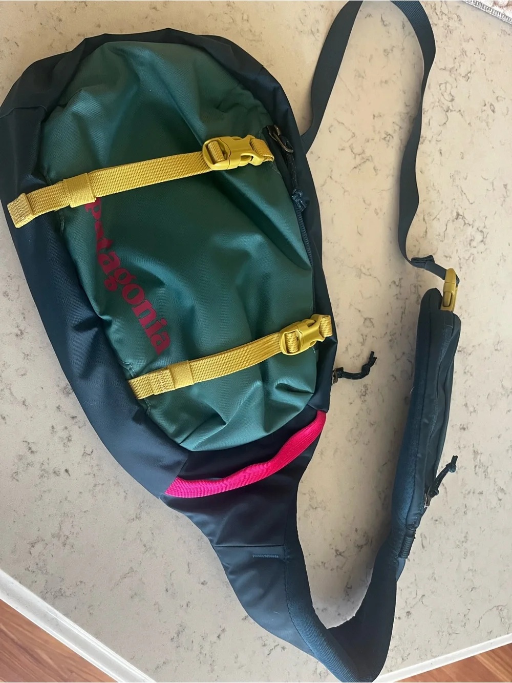 Patagonia Dark Green Sling Belt Bag with Yellow Straps and Pink Accent - Picture 1 of 2